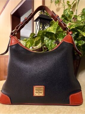 Dooney & Bourke Black Pebbled Leather Bag with Gold Plaque